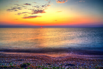 Beautiful summer sunrise over the beach