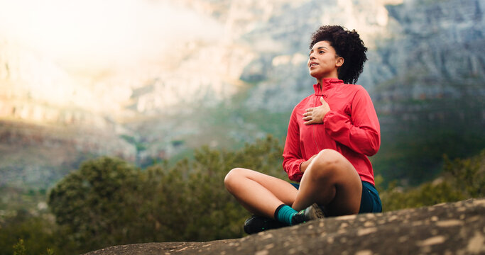 Breathing, outdoor and woman with fitness, relax and tired with heart health, nature and chakra. Wellness, person and hiker with break, peaceful and fatigue with balance and mountains in Canada - Powered by Adobe