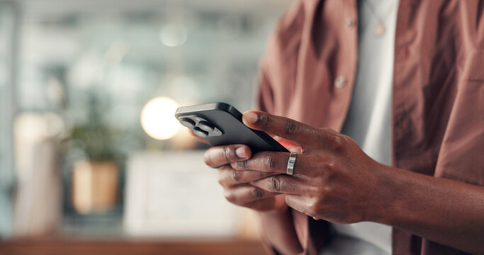 Cellphone, hands and man in office with networking, communication or contact on mobile app. Typing, technology and African male creative director with chatting online with phone in workplace.