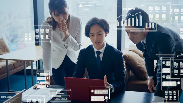 A group of business people having a meeting and software image