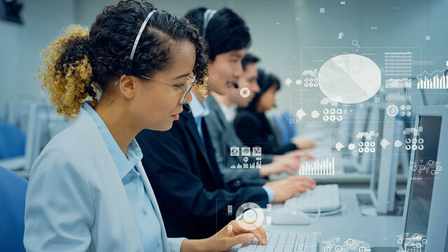 Multinational group working in office with statistical data - Powered by Adobe