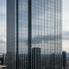 Abstract Blurry Reflection on Modern Skyscraper Glass Facade Surface

