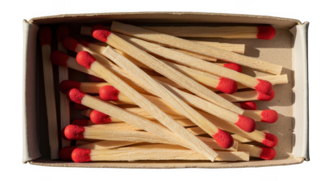 A close up top view of a box filled with wooden matches with red tips isolated on transparent background