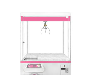 Close up empty large white claw machine decorated with pastel pink isolated