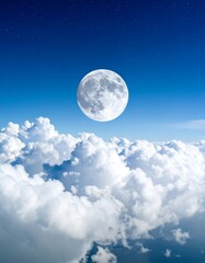 Full moon above clouds at night