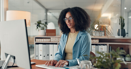 Woman, typing and employee with computer in office, administration or data entry of info on website. Online, transcriptionist and person with tech for financial report, graph and document in business