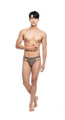 A fit, handsome Asian man in a leopard print swimsuit posing on a white background. This photo is ideal for fashion, swimwear, confidence, male beauty, and body care concepts.