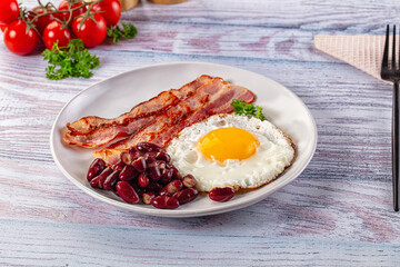 English breakfast with egg, bean and bacon