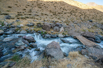 The scenic view of Reşko summit in the Sat (Cilo) mountains, Serpel and Horgedim plateau with its glaciers and glacier rivers in Hakkari, Turkey.