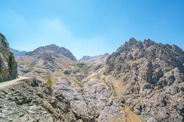 The scenic view of Reşko summit in the Sat (Cilo) mountains, Serpel and Horgedim plateau with its glaciers and glacier rivers in Hakkari, Turkey.