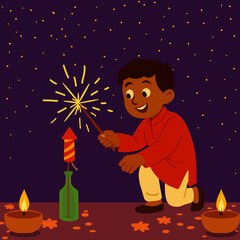 Happy boy lighting firecracker during diwali night