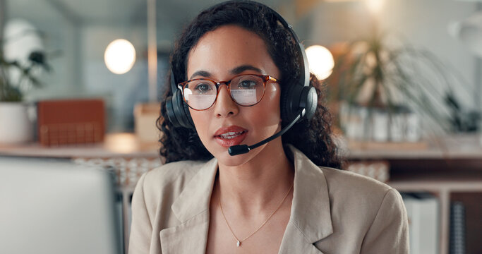 Business woman, night and consultant with headset in office for customer service or online advice. Female person, agent or working late with glasses or mic for virtual assistance or communication