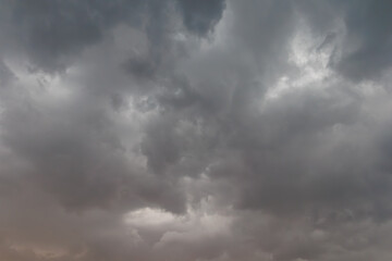 Dark storm clouds over evening sky