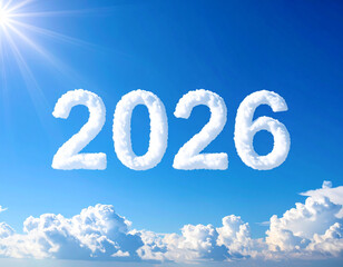 Fluffy white clouds forming 2026 numbers in bright blue sky, soft sunlight, dreamy and uplifting atmosphere for new year