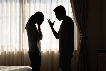 unhappy crying frightened woman, aggressive man shouting at home. Angry husband emotionally arguing screaming shouting to scared wife, verbal abuse, domestic violence relationship	