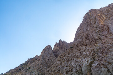 The scenic view of Reşko summit in the Sat (Cilo) mountains, Serpel and Horgedim plateau with its glaciers and glacier rivers in Hakkari, Turkey.