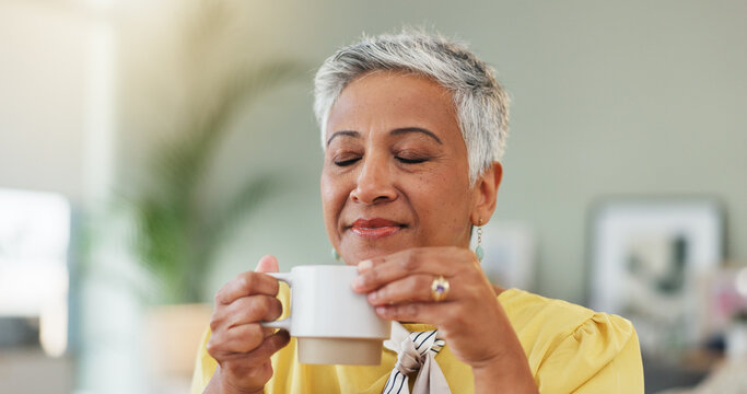 Thinking, senior and woman with coffee for smell, happy memory or nostalgia in living room. Thoughtful, elderly or female person with herbal tea for aroma, morning reflection or contemplation in home