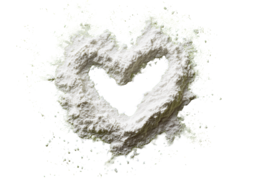 White powder shaped like a heart, surrounded by a cloud of the same powder