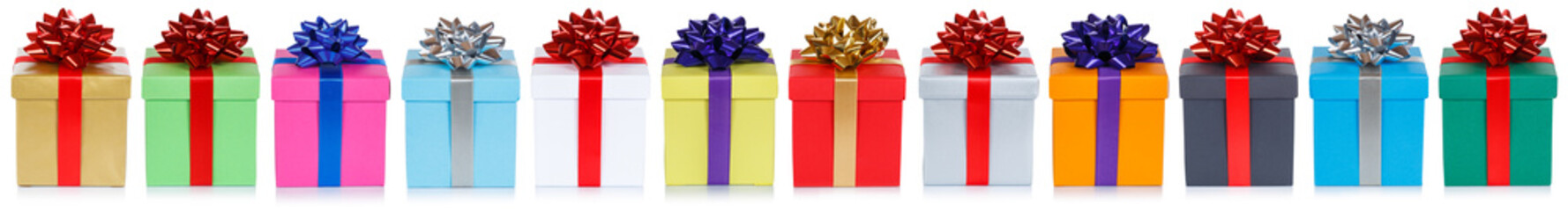 Many colorful christmas presents birthday gifts in a row banner isolated on a white background