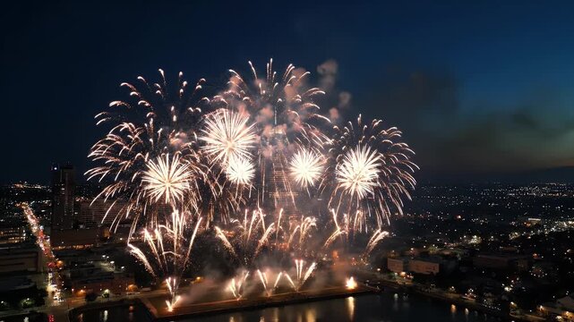 Spectacular Nighttime Fireworks Display Over Urban Skyline Illuminating the Darkness Celebratory Visuals 99