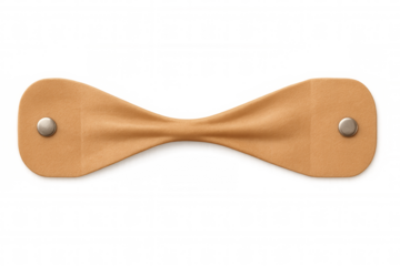 Curved beige leather label featuring metal rivets, isolated, highlighting sleek minimalist design and branding potential