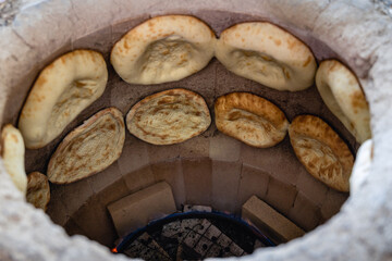 A large oven with bread inside