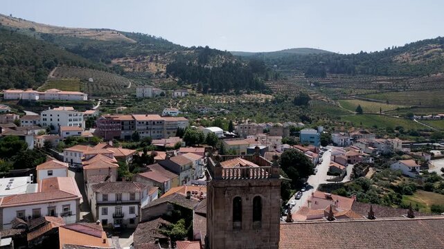 drone view of basilica menor de nossa senhora da assuncao with torre de moncorvo town portugal