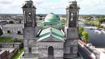 Drone reveal Church of Saints Peter and Paul over Athlone Castle. Picturesque town in Ireland