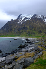 Seashore rocky coast with mountain view