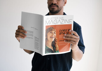 Mockup Of Man Reading Customizable Us Letter Magazine