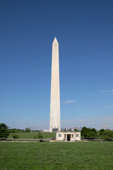 A view of the Washington monument with the bookstore on a sunny day