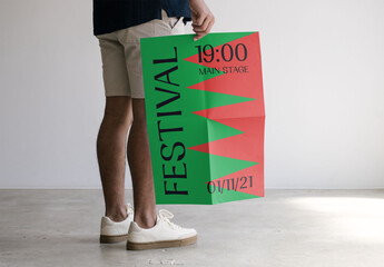 Mockup Of Man Holding Customized Poster, Low Section