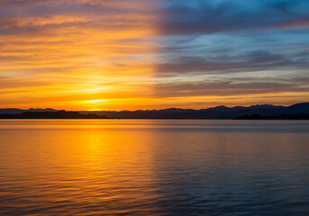 Dramatic Evening Sky over Blue Water, Scenic Seascape Background
