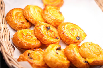 Baked homemade bakery, Danish or tart pie are served in plate at morning breakfast buffet. Close-up and selective focus at the center part, Bakery food photo.