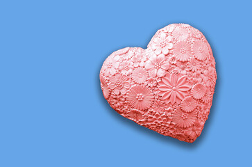 pink plaster heart on a blue background. holiday concept. place for text