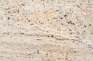 Texture of granite abstract slab in beige color.