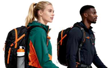 a man and a woman are hiking and wearing outdoor equipment like jackets and backpacks.