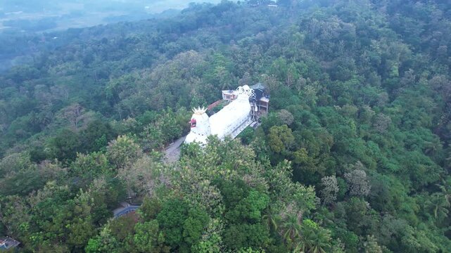 Unique building known as Gereja Ayam or Chicken Church in Magelang, Central Java, Indonesia, shaped like a giant chicken and serving as a prayer house and tourist attraction.