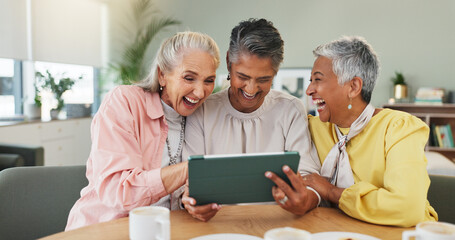 Fototapeta premium Laughing, senior and women in nursing home with tablet, entertainment and funny online post. Happy, elderly and female people in retirement center with technology, video streaming or internet comedy