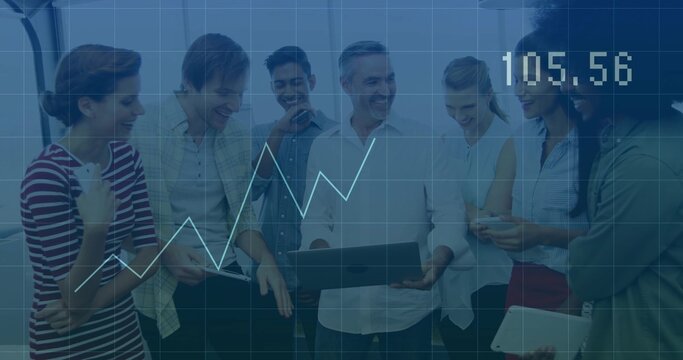 Business team collaborating in meeting room, viewing laptop and mobile devices charting 105