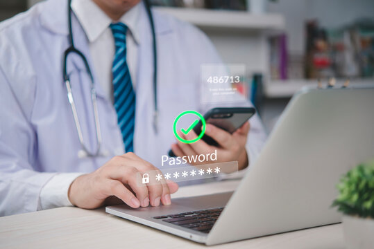 Doctor using two factor authentication on laptop with OTP code and password verification on smartphone, concept of cybersecurity, secure medical data access, and healthcare privacy protection.