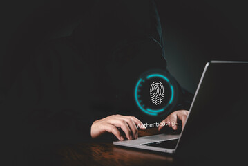 Authentication, Security Hands on a keyboard with a glowing fingerprint UI authenticating on a laptop to demonstrate protected access, data protection, and cyber threat concept.