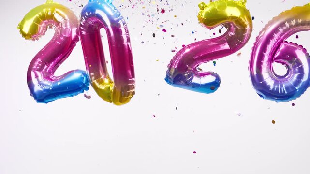 Sparkling 2026 new year balloon and vibrant, flying confetti.Happy new year 2026