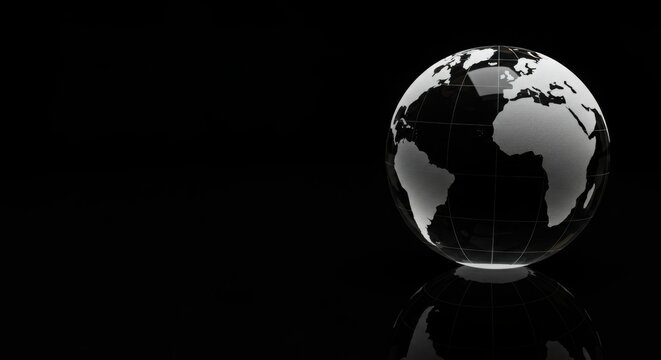 Luxury crystal globe on reflective black background, business and corporate theme