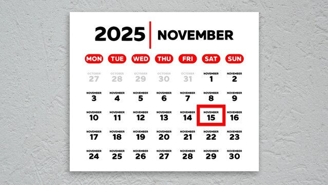The date November 15th marked with a red cursor on the wall calendar 2025