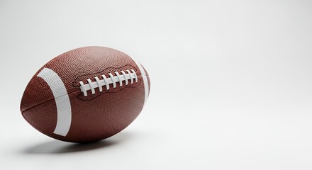 Isolated american football close-up on white background for sports themed designs and advertising material ready for your design projects