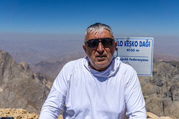 Cilo Mountains, Hakkari, Turkey - August 25, 2025: Mountaineers are climbing the Reşko summit (4135 m.) in the Sat (Cilo) mountains with its glaciers and glacier rivers in Hakkari, Turkey.