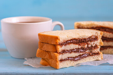 Chocolate spread sandwich for tasty breakfast.