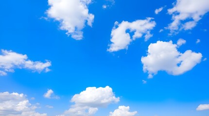 Beautiful overhead view of clear sky and puffy clouds, cinematic 16:9 format designed for wide background applications