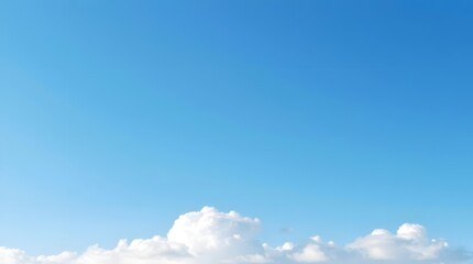 Bright blue sky and fluffy white clouds, panoramic 16:9 ratio ideal for landscape design, travel visuals, and creative use